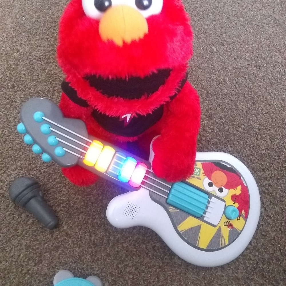 Elmo let's rock talking with instruments guitar